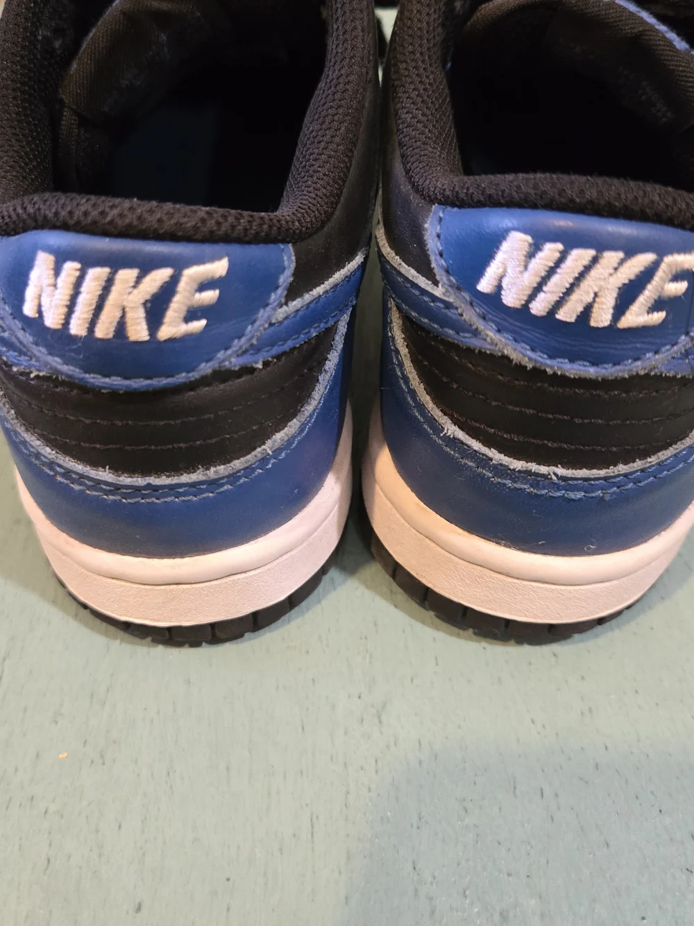 Nike Low-Top Sneakers in Black, White & Blue